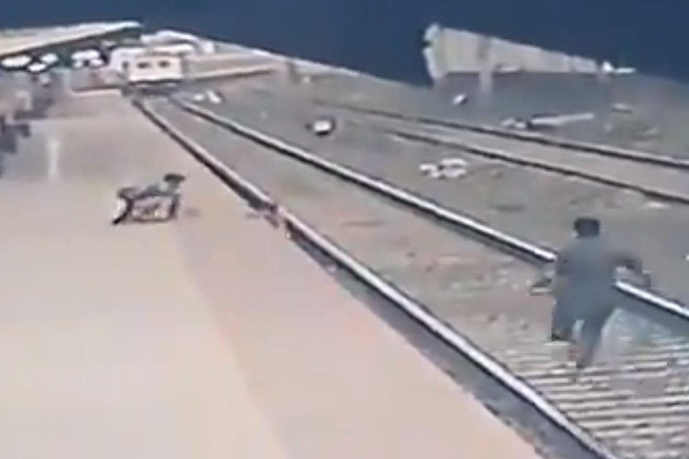 Train worker saves boy life from running train in India